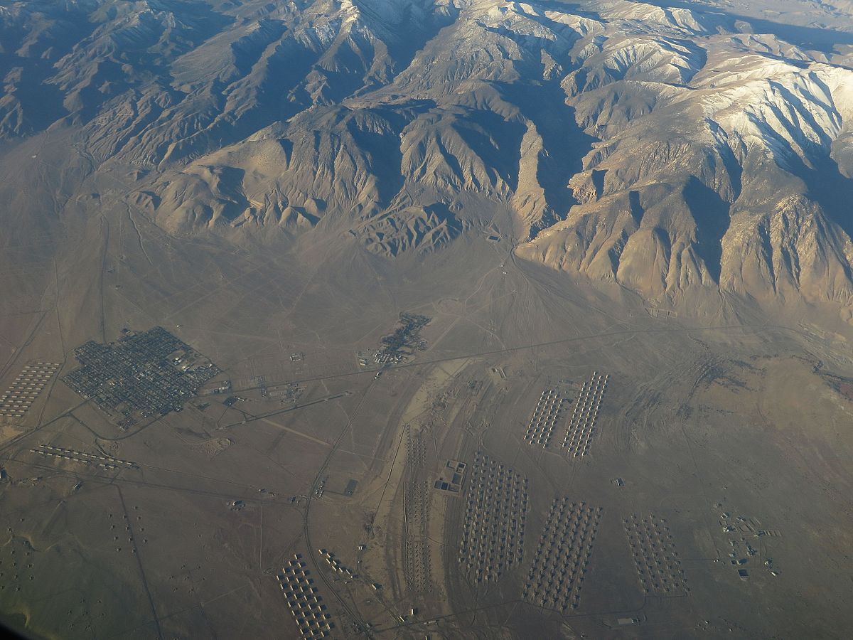 Ammunition storage bunkers at a military depot, representative of earth-covered magazine construction typical of bulk explosive storage facilities