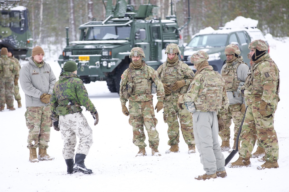 US Army soldiers conducting anti-tank mine emplacement training during Exercise Arctic Forge