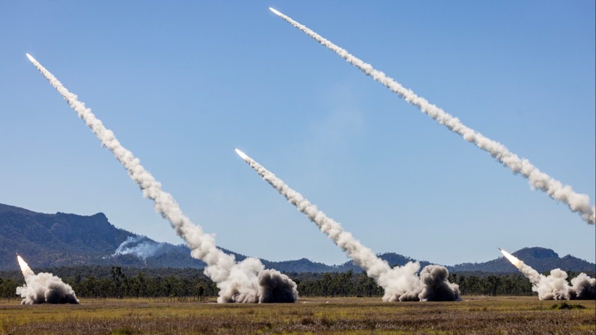 A Guided Multiple Launch Rocket System (GMLRS) rocket launching on Australian territory during a multinational HIMARS live-fire exercise.