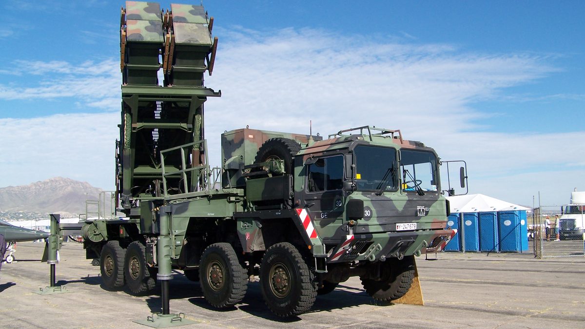 A German Patriot surface-to-air missile launcher displayed with four missile canisters elevated to firing position.