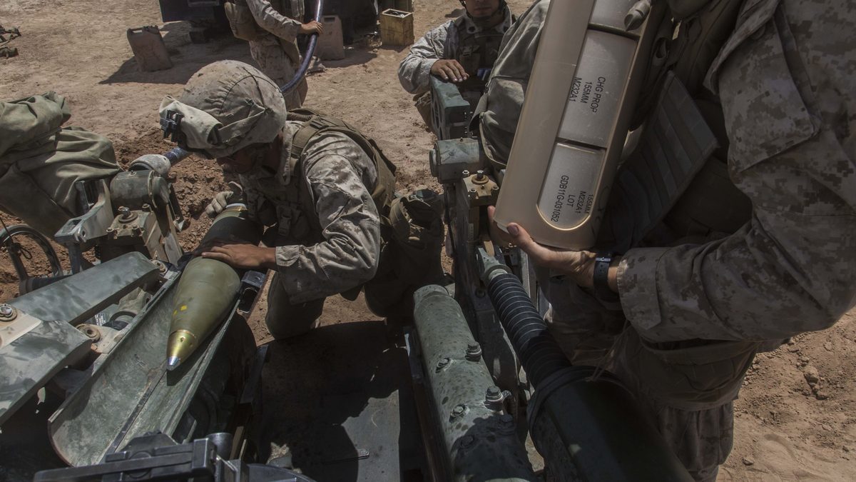 U.S. Marine loads M232 MACS propelling charges into an M777A2 155mm howitzer during Exercise Desert Scimitar, Twentynine Palms, May 2014