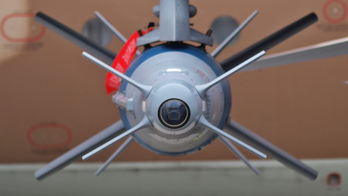 Rafael SPICE precision-guided bomb mounted under the wing of an Israeli Air Force F-16I — representative of the air-launched PGM family Elbit co-produces for Israel MoD