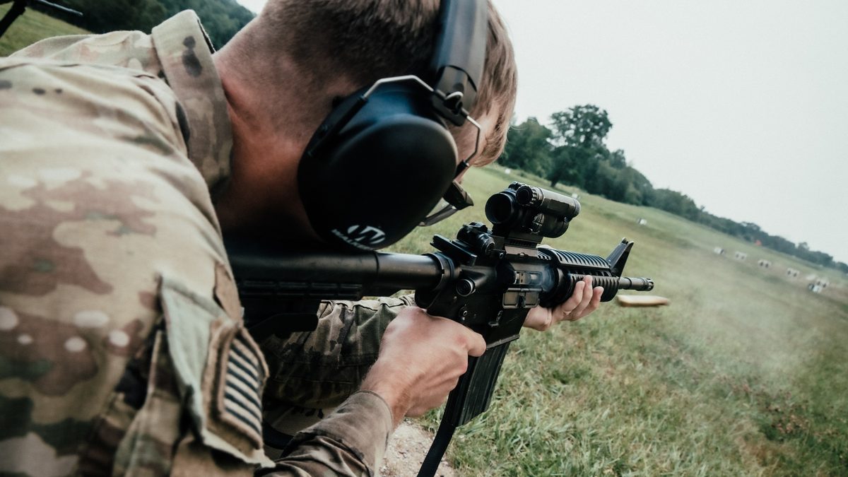 A West Point cadet fires an M4 carbine on a basic rifle marksmanship course run by the U.S. Army Marksmanship Unit