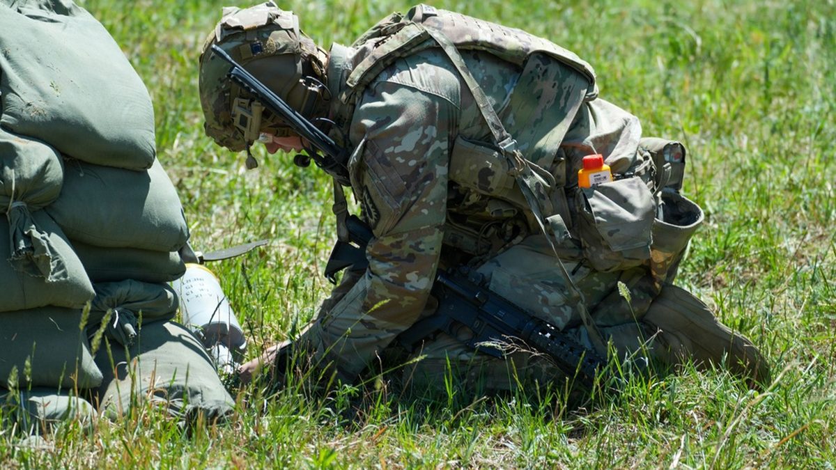 Staff Sgt. Justin R. Bowman of the 38th Ordnance Company EOD examines ordnance during the 2026 All-Army EOD Team of the Year Competition at Fort Lee, Virginia