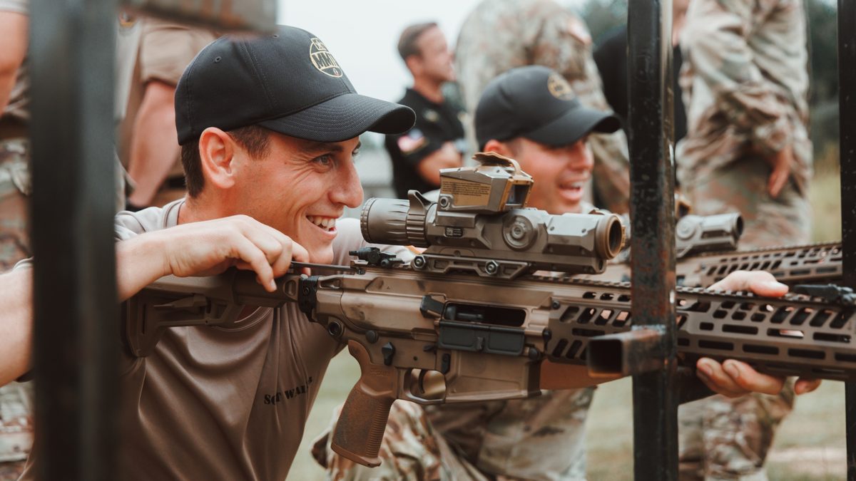 Two U.S. Army Marksmanship Unit instructors familiarising with the M7 rifle and Vortex M157 NGSW-FC fire-control optic during a Master Trainer Course at Fort Benning, Georgia, July 2025.