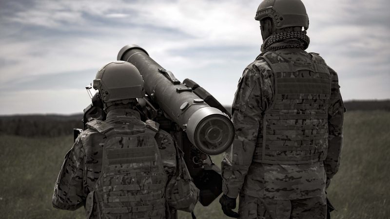 Two soldiers with RBS 70 man-portable launcher in field, image from Lithuania order press release
