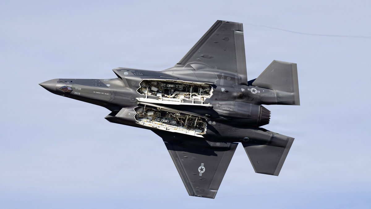 A U.S. Air Force F-35A Lightning II performs the signature weapons-bay-door pass with the internal bay fully open in flight, flown by Maj. Sean &lsquo;Rambo&rsquo; Loughlin of the F-35A Demonstration Team during FIDAE 2026 in Santiago, Chile.