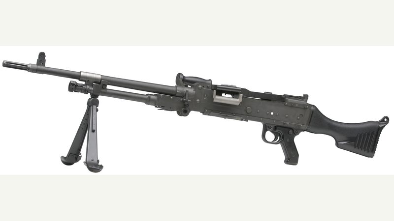 Left side profile of the baseline FN MAG 7.62 mm general purpose machine gun on its bipod