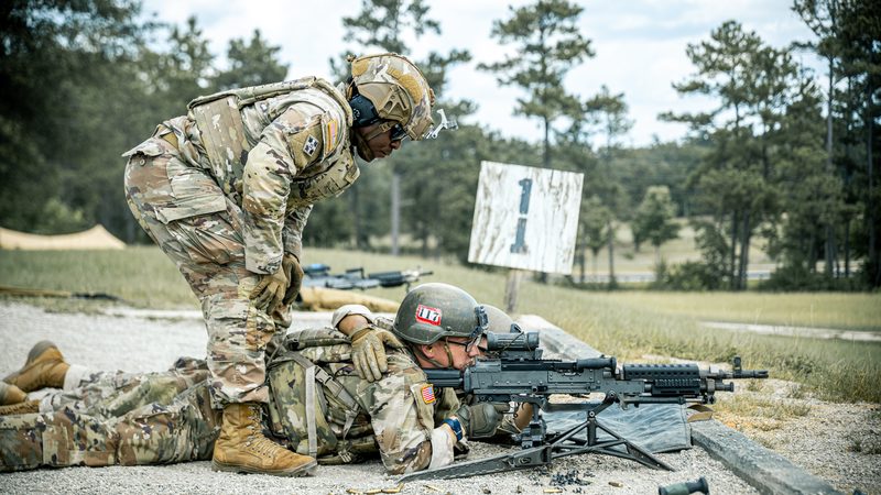 US Army trainees fire the M240L machine gun with mounted optic at Fort Benning, Georgia, July 2025