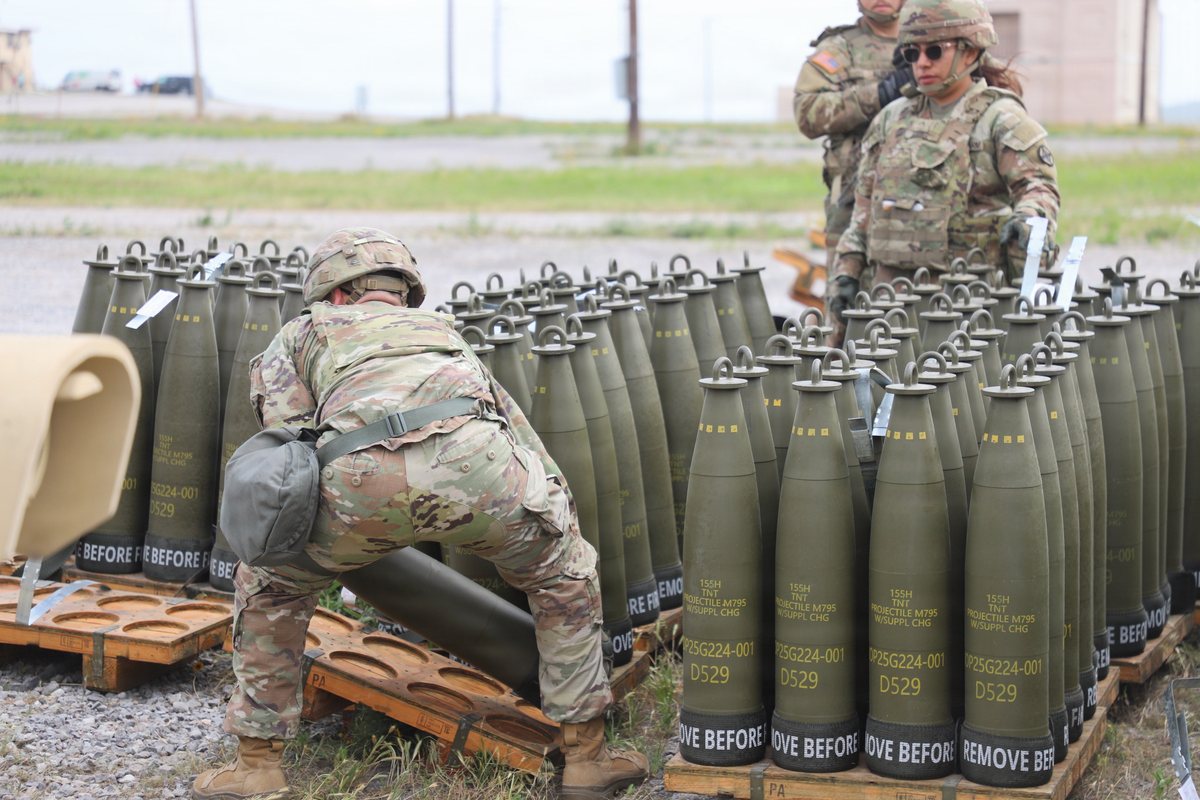 A US Army soldier loads ammunition into an M992A3 Carrier Ammunition Tracked vehicle at Fort Sill, Oklahoma
