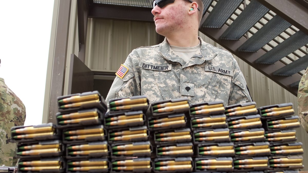 Stripper clips of 5.56mm ammunition staged for US Army marksmanship training