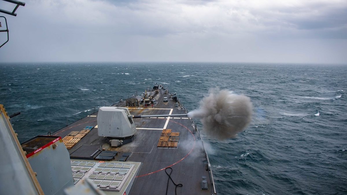 The guided-missile destroyer USS Winston S. Churchill fires its Mk 45 Mod 4 5-inch 62 calibre gun during a live-fire demonstration.