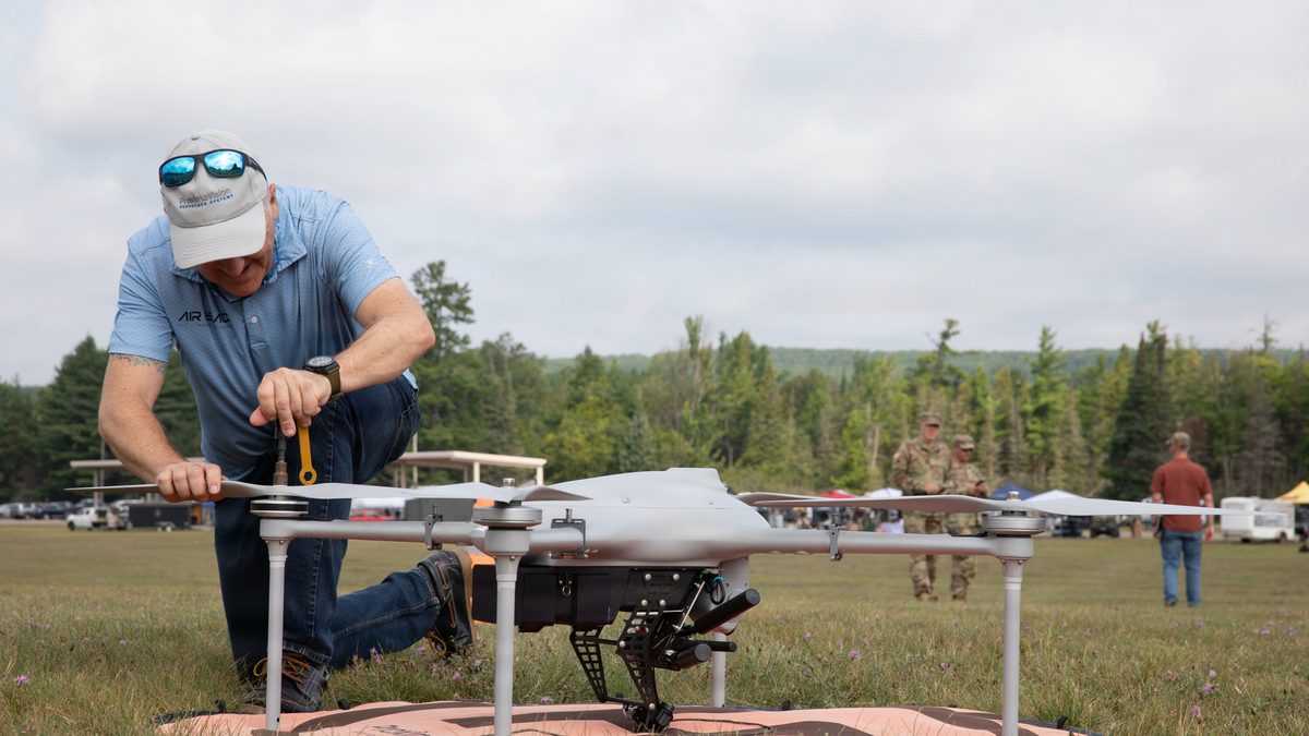 Industry pilot prepares a tethered drone for flight at an Army Industry Day, Camp Grayling, Northern Strike 26-2